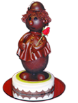 Kuchen mit kunstvoller Schokoladenfigur